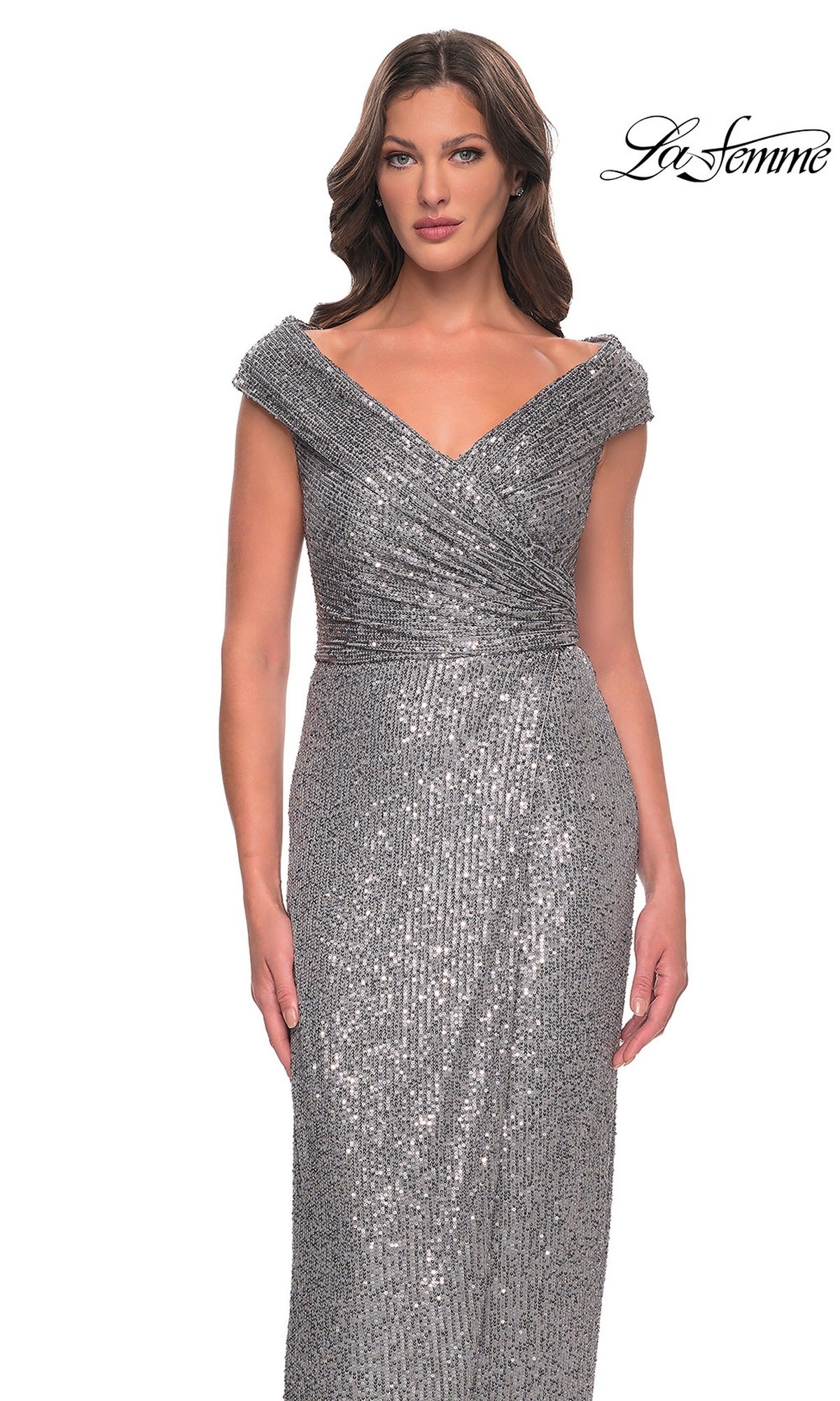 Woman in silver off-the-shoulder long sequin dress with fitted sheath silhouette and draped detail. La Femme 30326 logo appears top right.